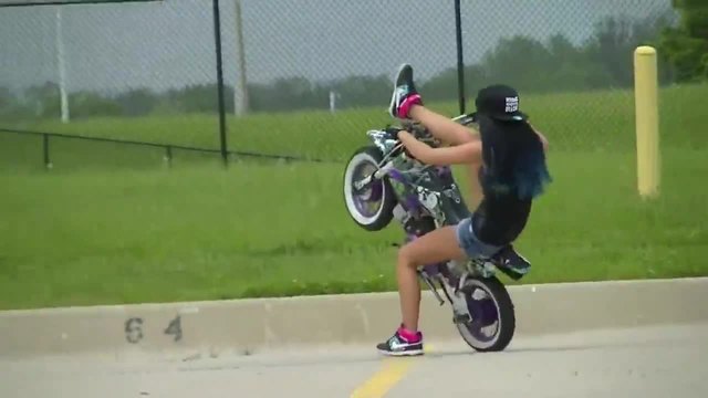 Girl have fun on a 50cc