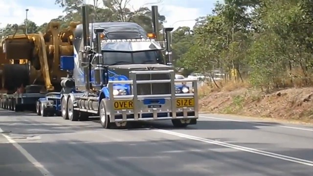 Мощный фронтальный погрузчик Caterpillar грузоподъемностью 45 000 кг